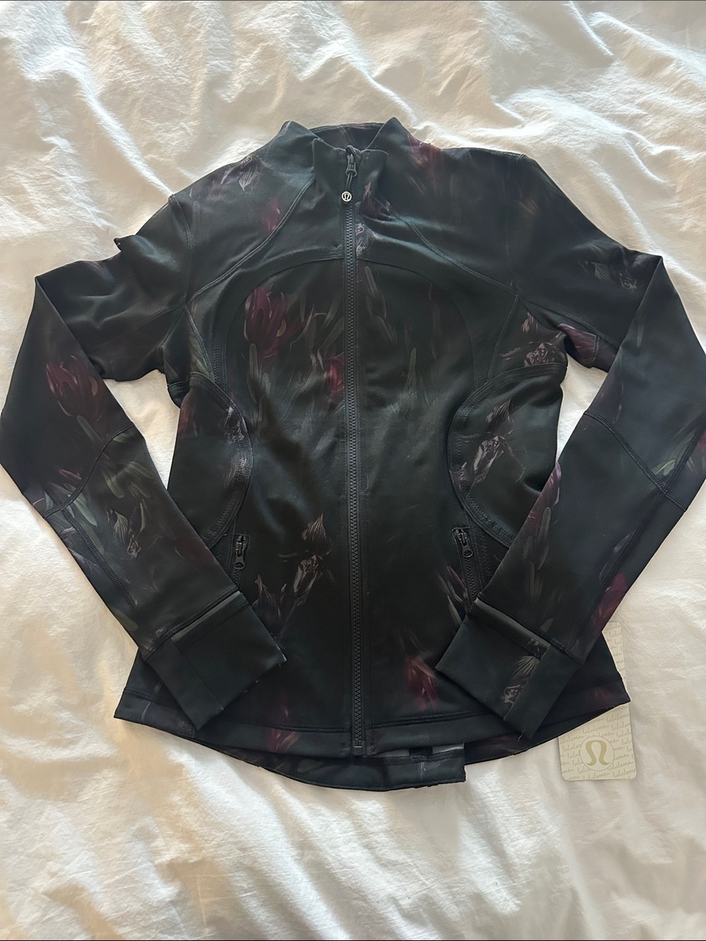 lululemon athletica Black Forme Jacket with Subtle Purple Floral Print